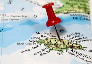 Map of Jamaica, in the Caribbean. Red map pin attached to Jamaica to illustrate this country is featured.