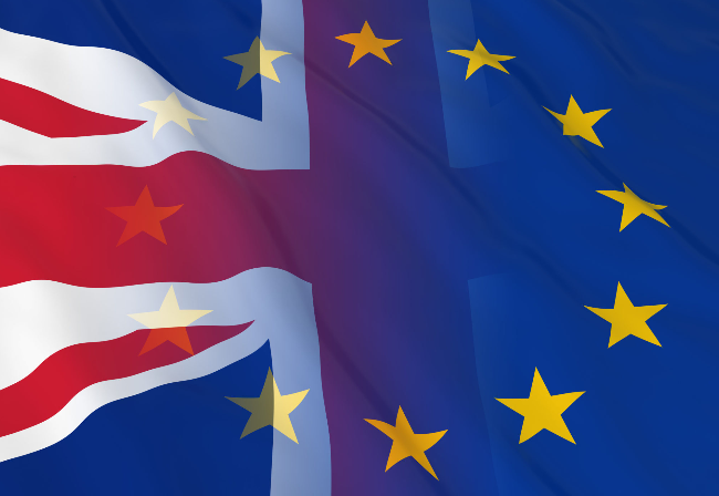 UK union jack flag fades into the EU star flag