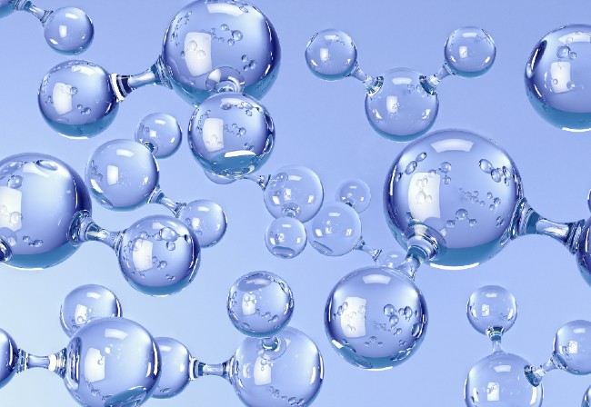 Lots of bubbles floating on a blue background