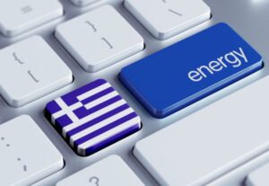 keyboard with one key showing the Greek flag, the second showing the word energy